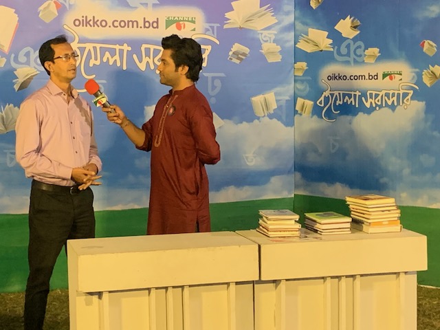 “Speaking on the popular TV channel `Channel I' at the Amar Ekushey Book Fair.”