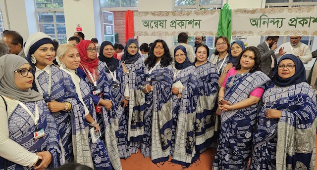 At the Bangladesh Book Fair’s Literature and Cultural Festival, UK a gathering of expatriate writers and readers in front of the Annesha Publications stall.”